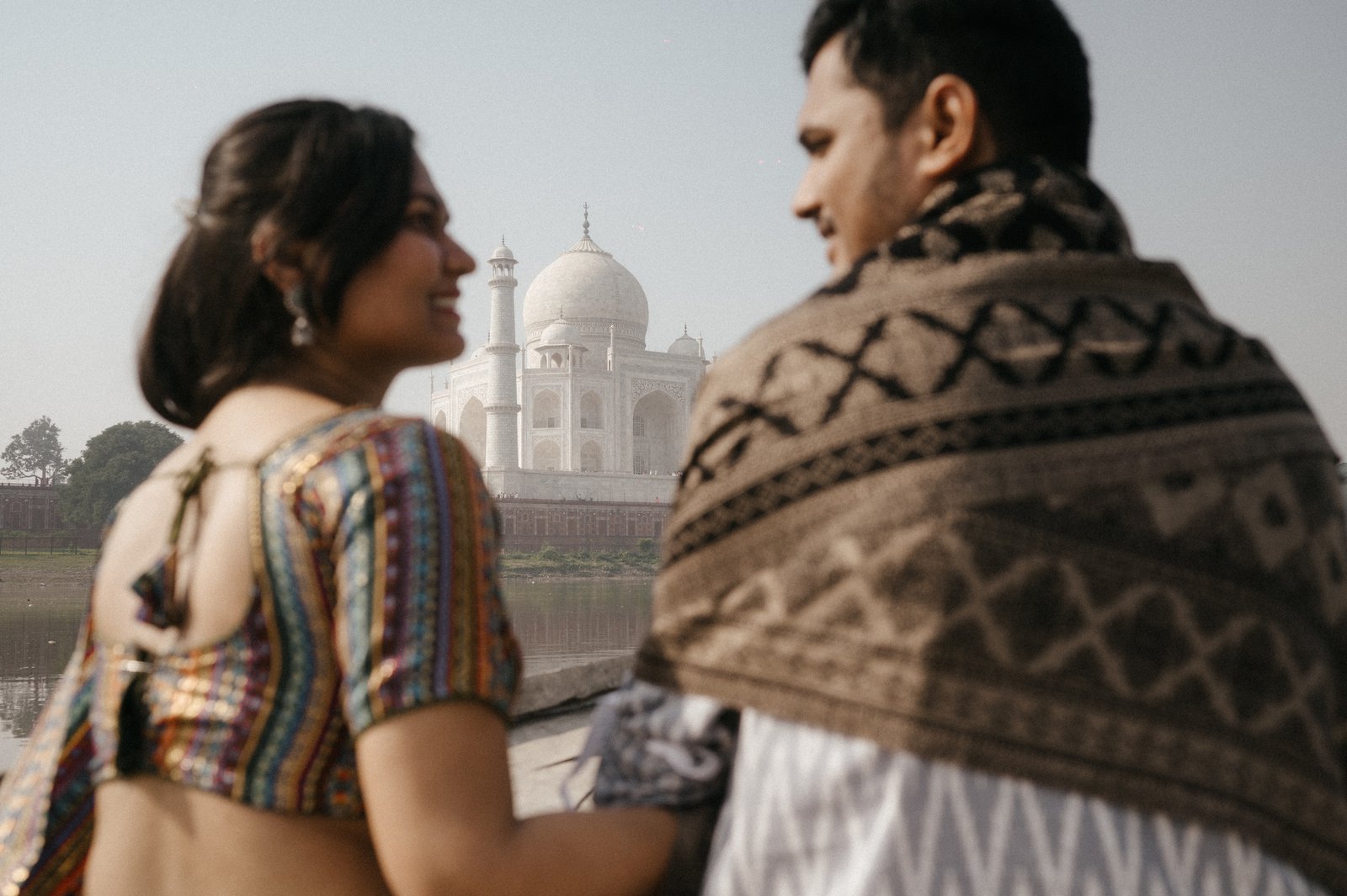 Candid embrace in moody light